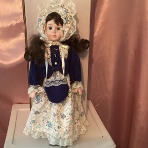 Elegant Blue and White Porcelain Doll